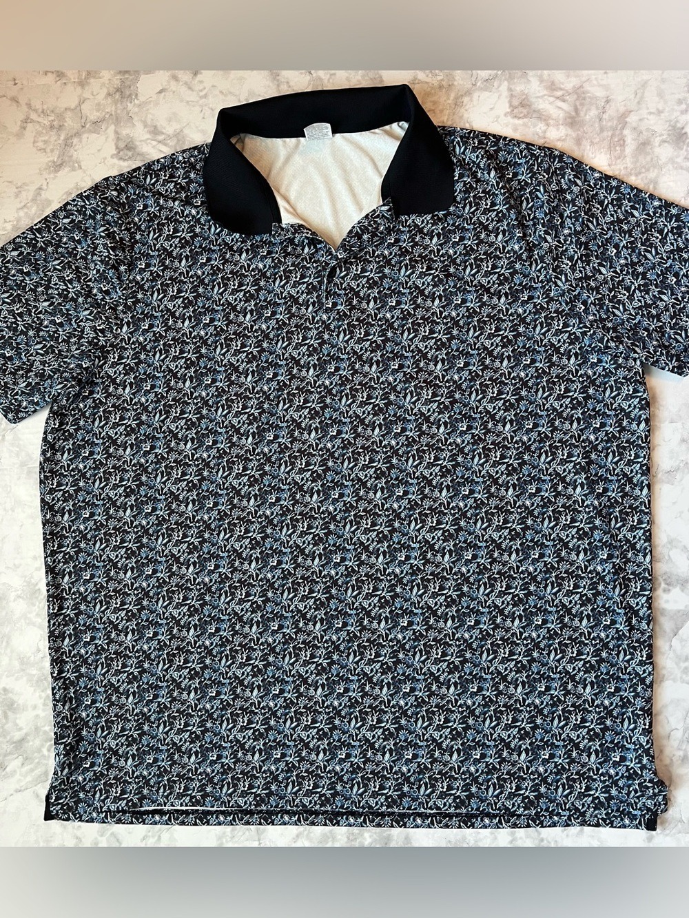 All In Motion Menโs Black and Light Blue Floral-Pattern Performance Golf Polo